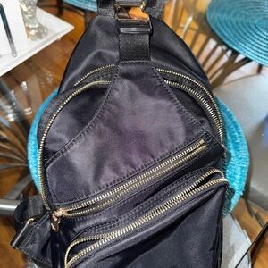 Sleek Black Crossbody Bag with Multiple Compartments